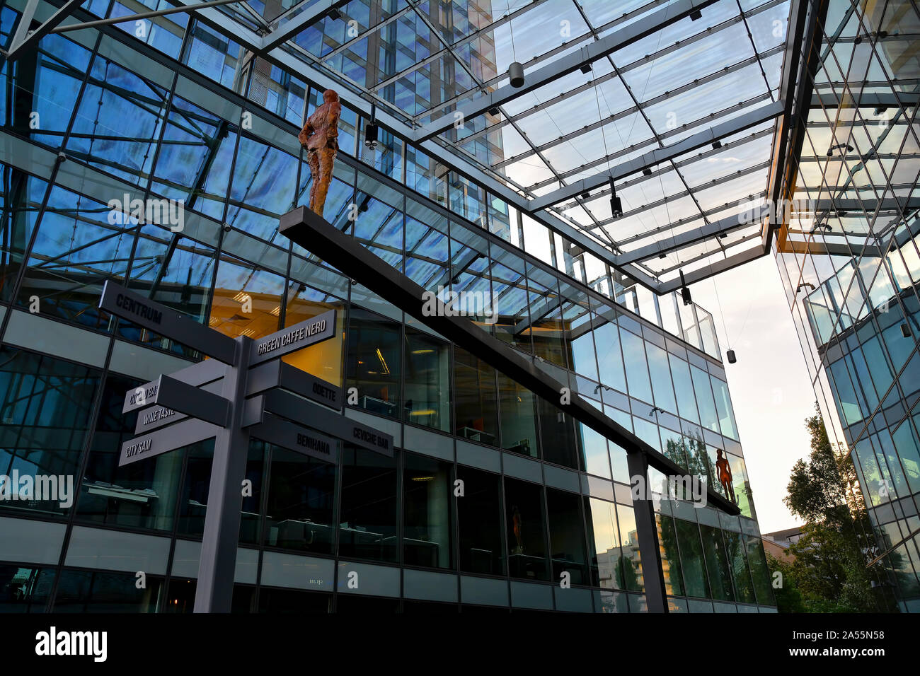 Amazing urban building architecture  and reflection of  the Cosmopolitan Twarda 2/4 center and tower known as Twarda or Hines Tower  in Warsaw, Poland Stock Photo