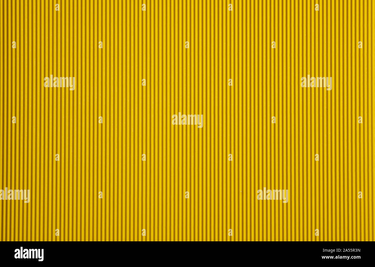Corrugated cardboard paper yellow color background and texture, copy space. Stock Photo