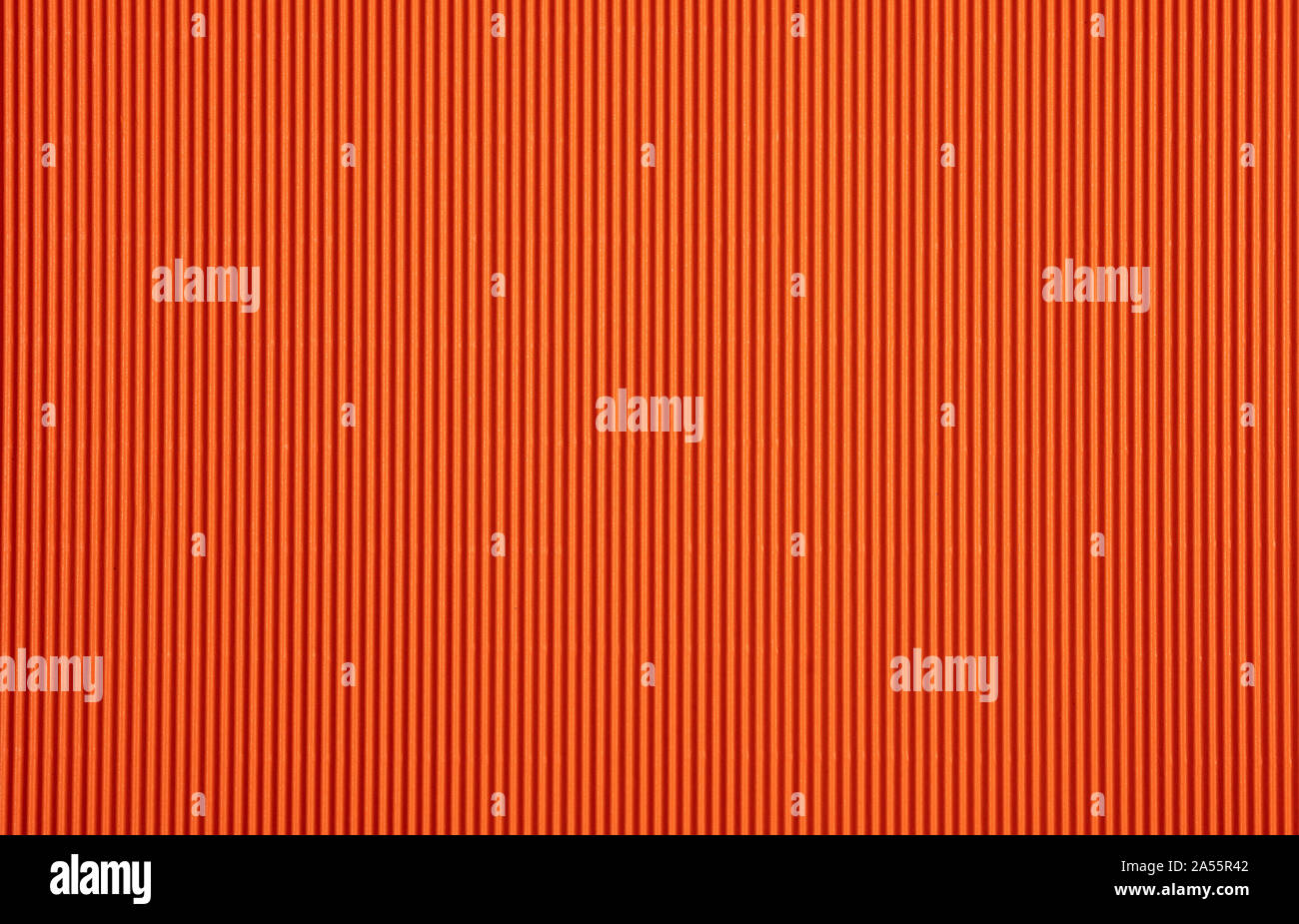 Corrugated cardboard paper orange color background and texture, copy space. Stock Photo