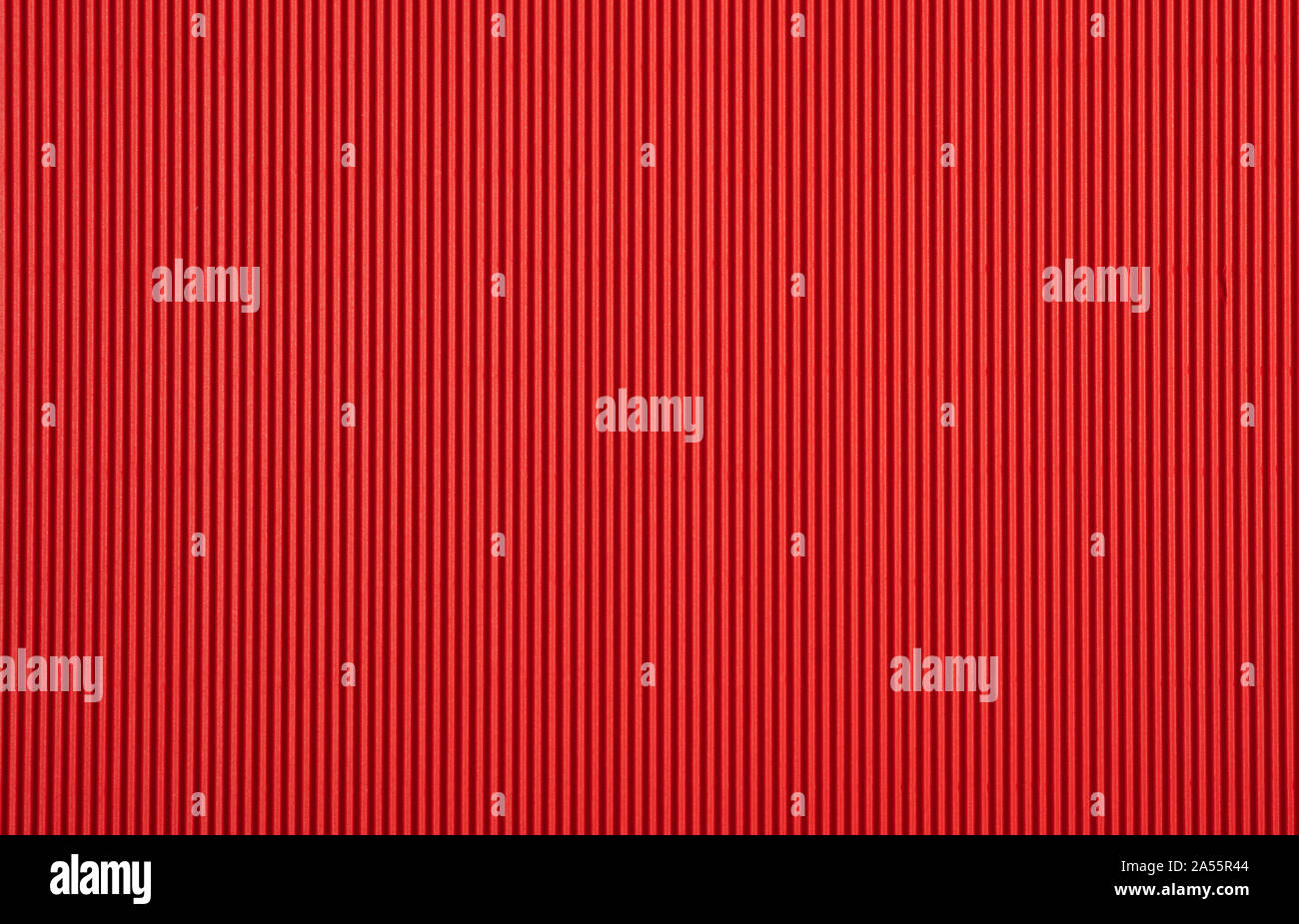 Corrugated cardboard paper red color background and texture, copy space. Stock Photo