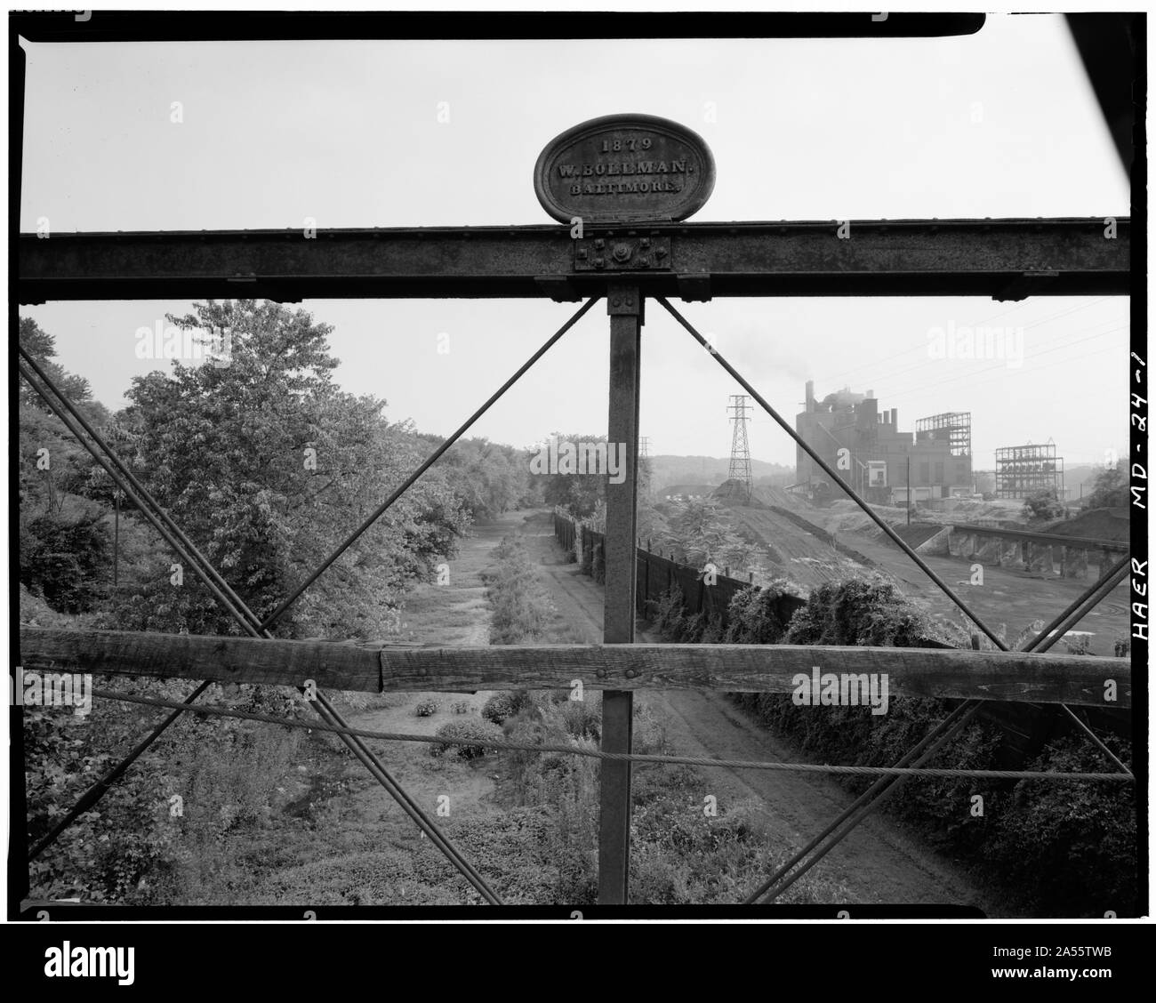 VIEW OF CAST-IRON MAKER'S PLATE, BOLTED TO TOP CHORD OF BRIDGE, MARKED '1879, W. BOLLMAN, BALTIMORE.' - Salisbury Street Bridge, Spanning CandO Canal (Milepost 99.65) and WM Railroad, Williamsport, Washington County, MD Stock Photo