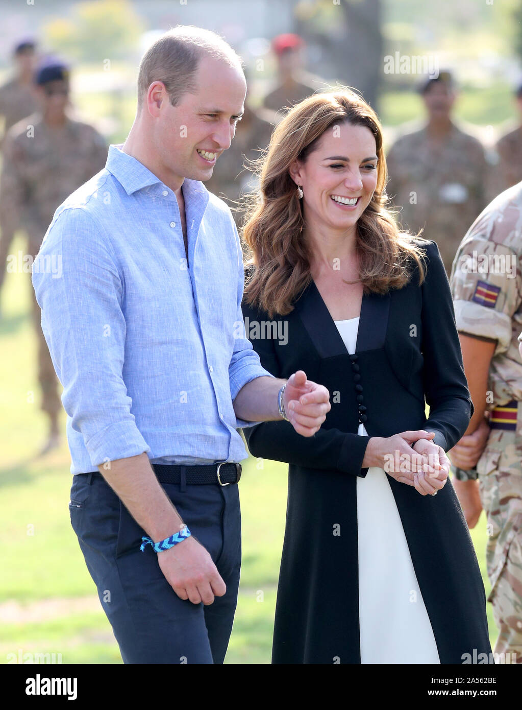 The Duke and Duchess of Cambridge during a visit to the Army Canine Centre, where the UK provides support to a programme that trains dogs to identify explosive devices, in Islamabad, on the fifth and final day of the royal visit to Pakistan. Stock Photo