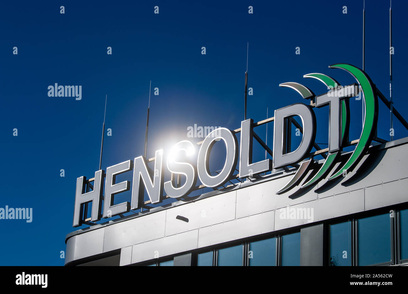 Taufkirchen, Germany. 16th Oct, 2019. The logo of the Hensoldt armaments group is illuminated by the sun. The main product areas of the multinational company are radars and optoelectronic systems, electronic warfare and avionics. Credit: Lino Mirgeler/dpa/Alamy Live News Stock Photo