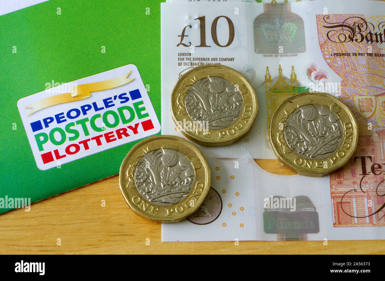 People's Postcode Lottery With Money, UK Stock Photo