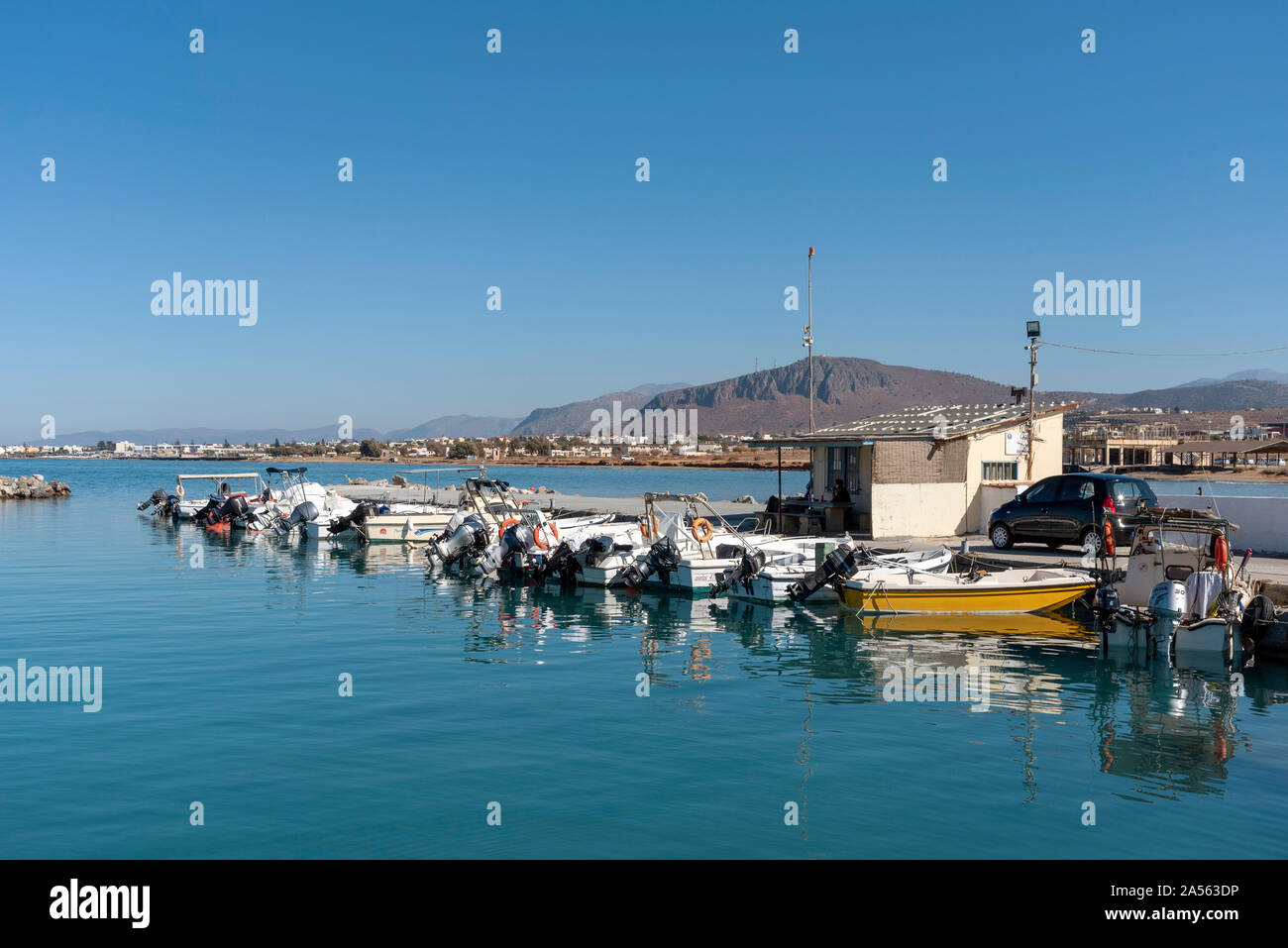 Gouves, Crete, Greece. October 2019. The small fishing boat harbour at Kato Gouves a former US military air base near Herkalion Stock Photo