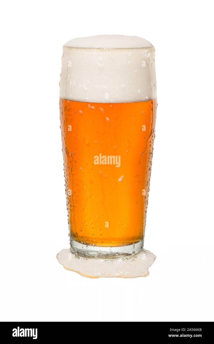 Craft Pub Beer Glass with Beer Spilt. Stock Photo
