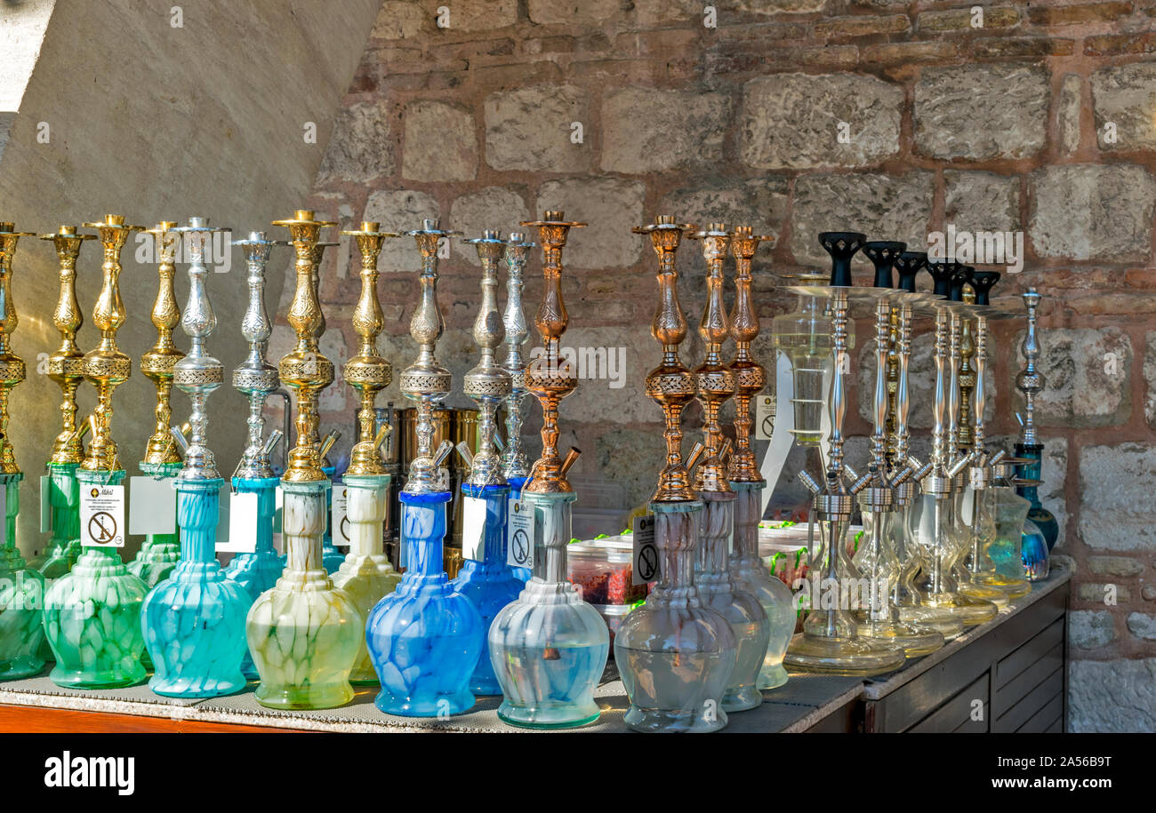 ISTANBUL TURKEY COLOURFUL GLASS NARGHILES AND PIPES READY FOR SMOKING Stock Photo