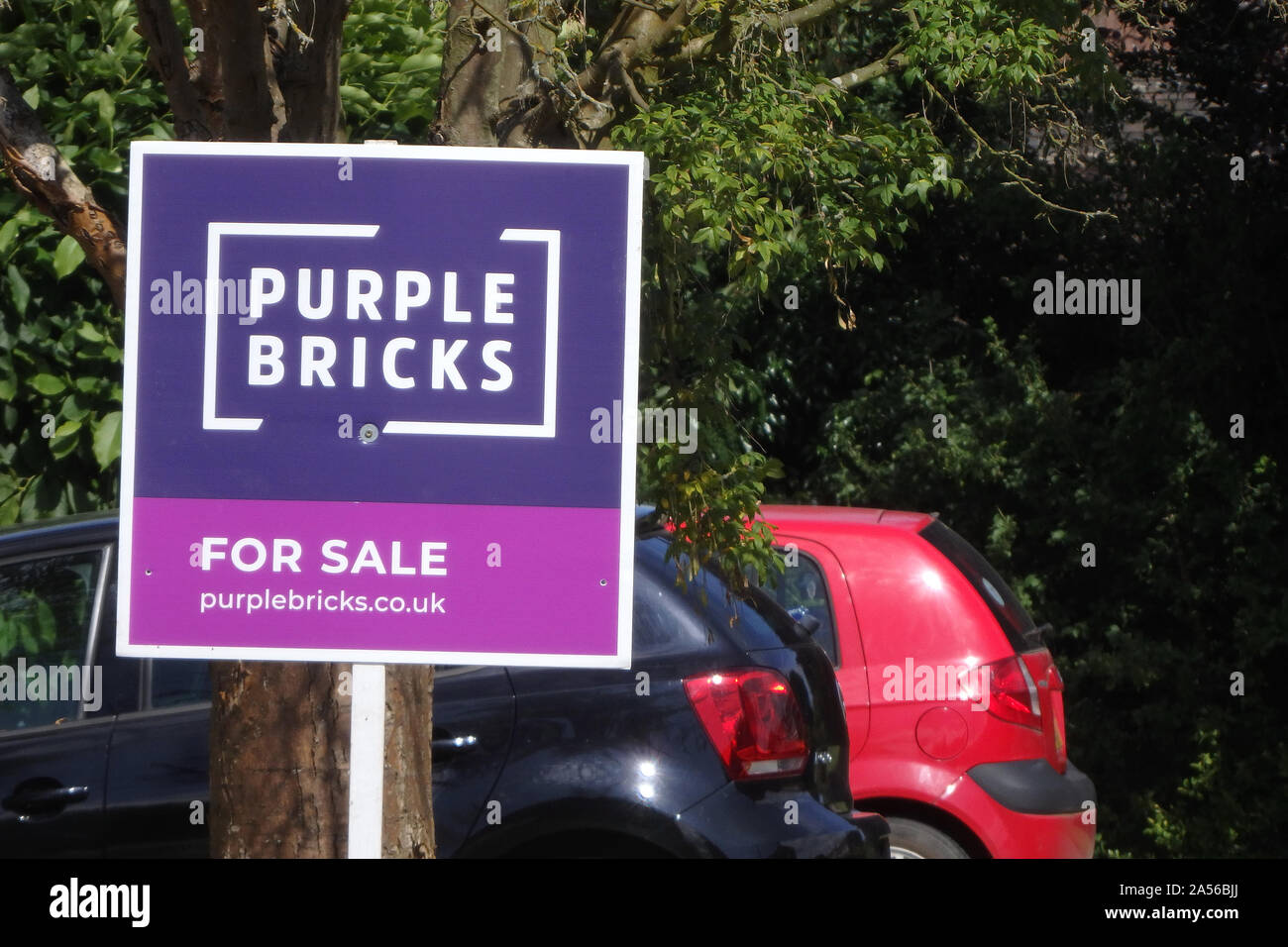 Purple bricks estate agents sign hires stock photography and images