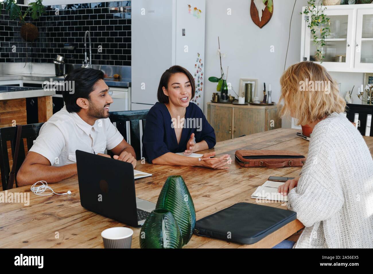 Colleagues having discussion in office Stock Photo