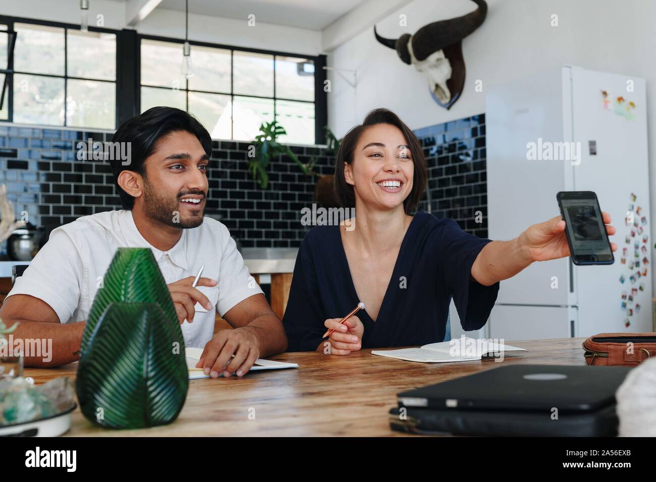 Colleagues having discussion in office Stock Photo