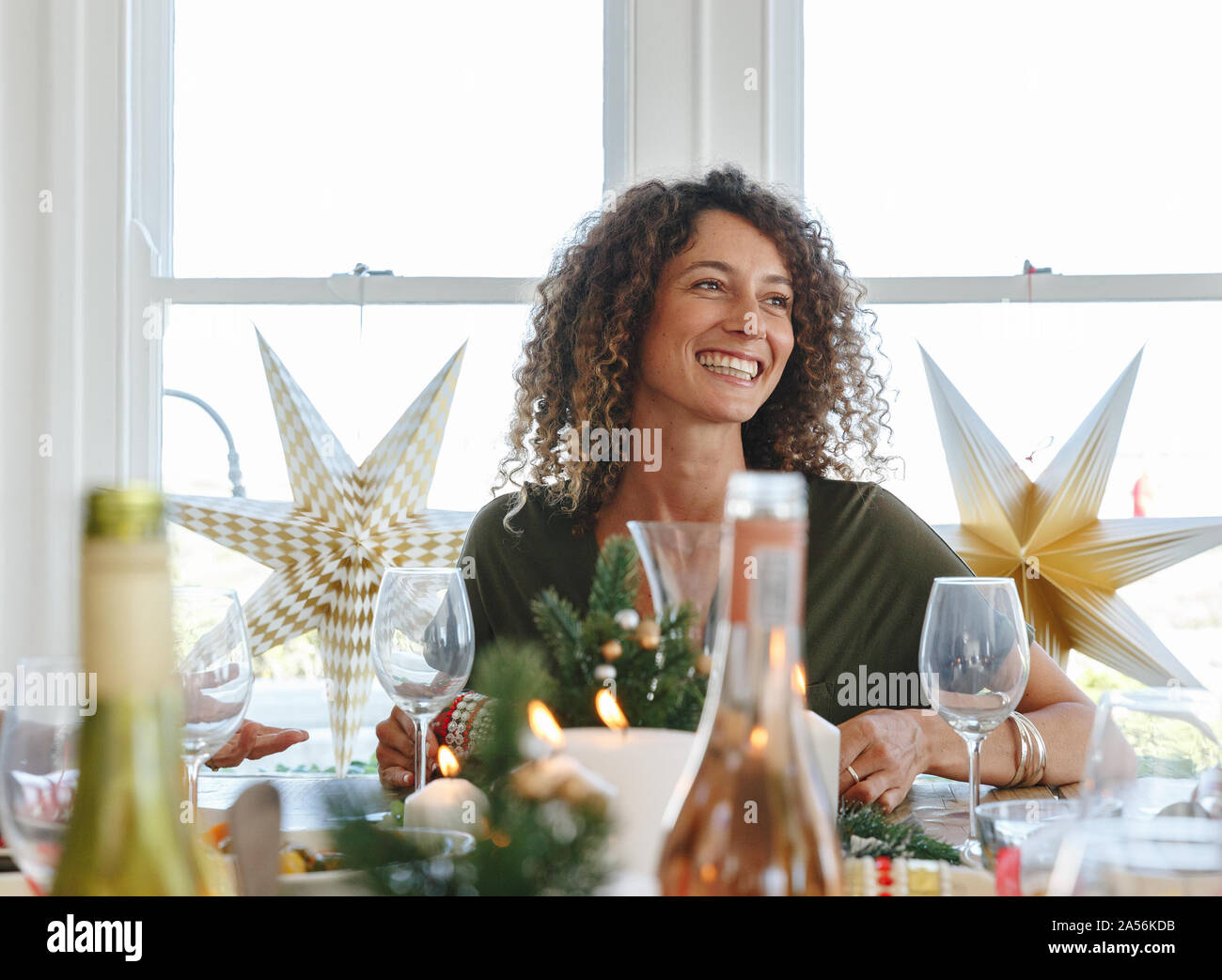 Woman dining at home party Stock Photo