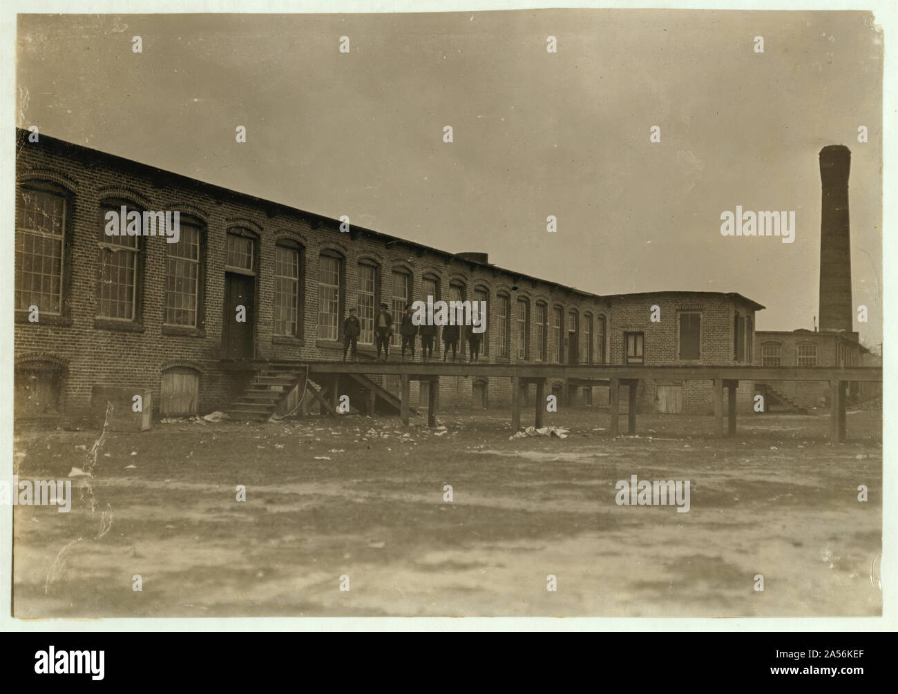 View of Scotland Mills, Laurinburg, N.C. All these boys work in mill. Sunday, Dec. 6/08. Witness, Sara R. Hine. Abstract: Photographs from the records of the National Child Labor Committee (U.S.) Stock Photo