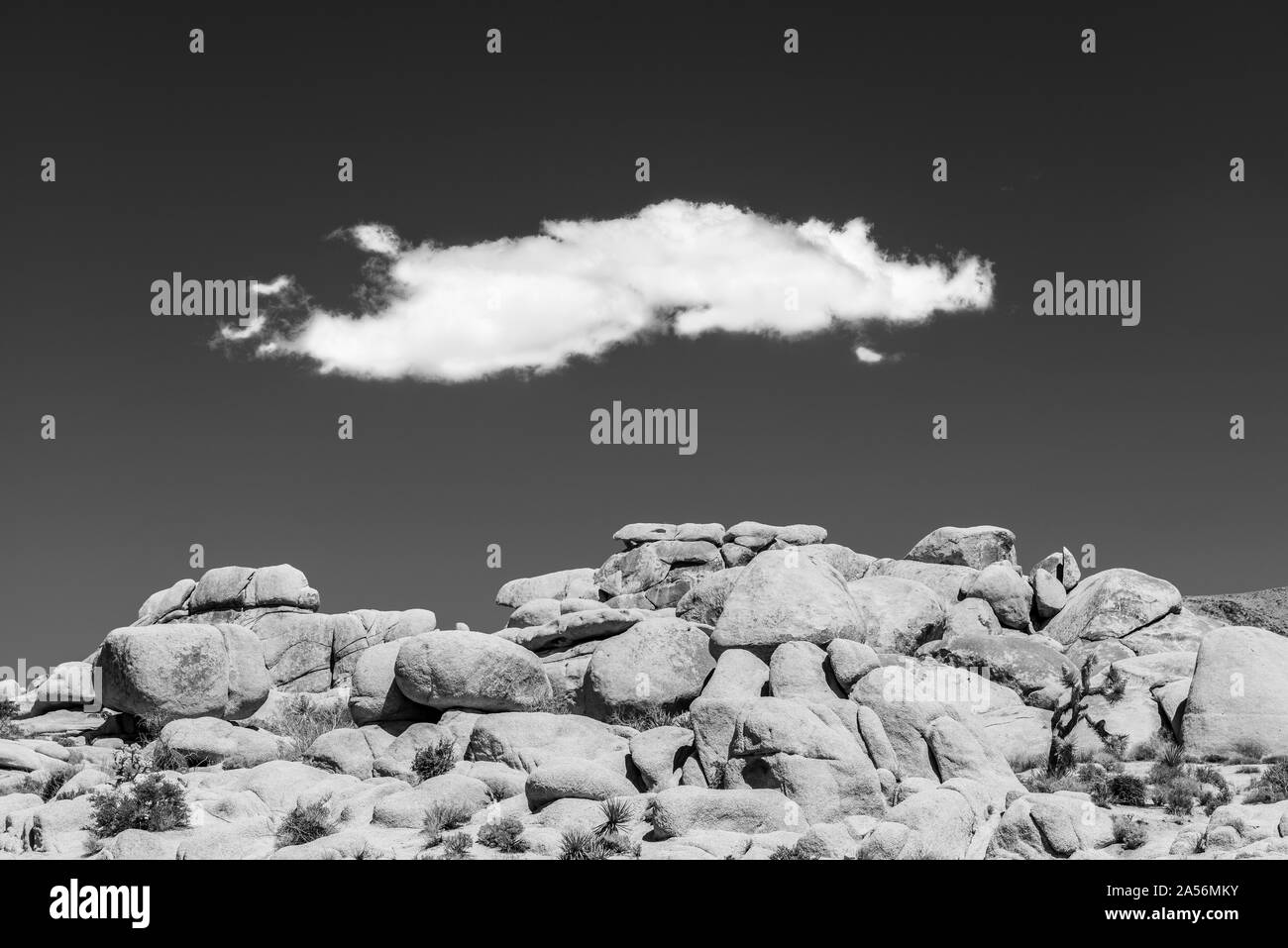 Cloud over Monzogratnite Formation. Stock Photo
