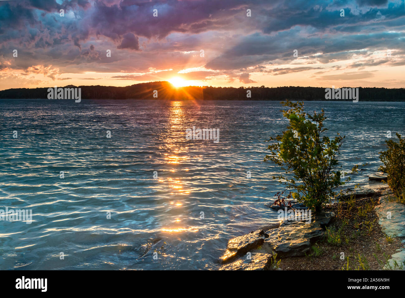 Recreation summer vacation lake sunset sky clouds weather water front