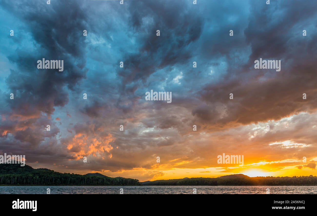 Recreation summer vacation lake sunset sky clouds weather water front hires stock photography