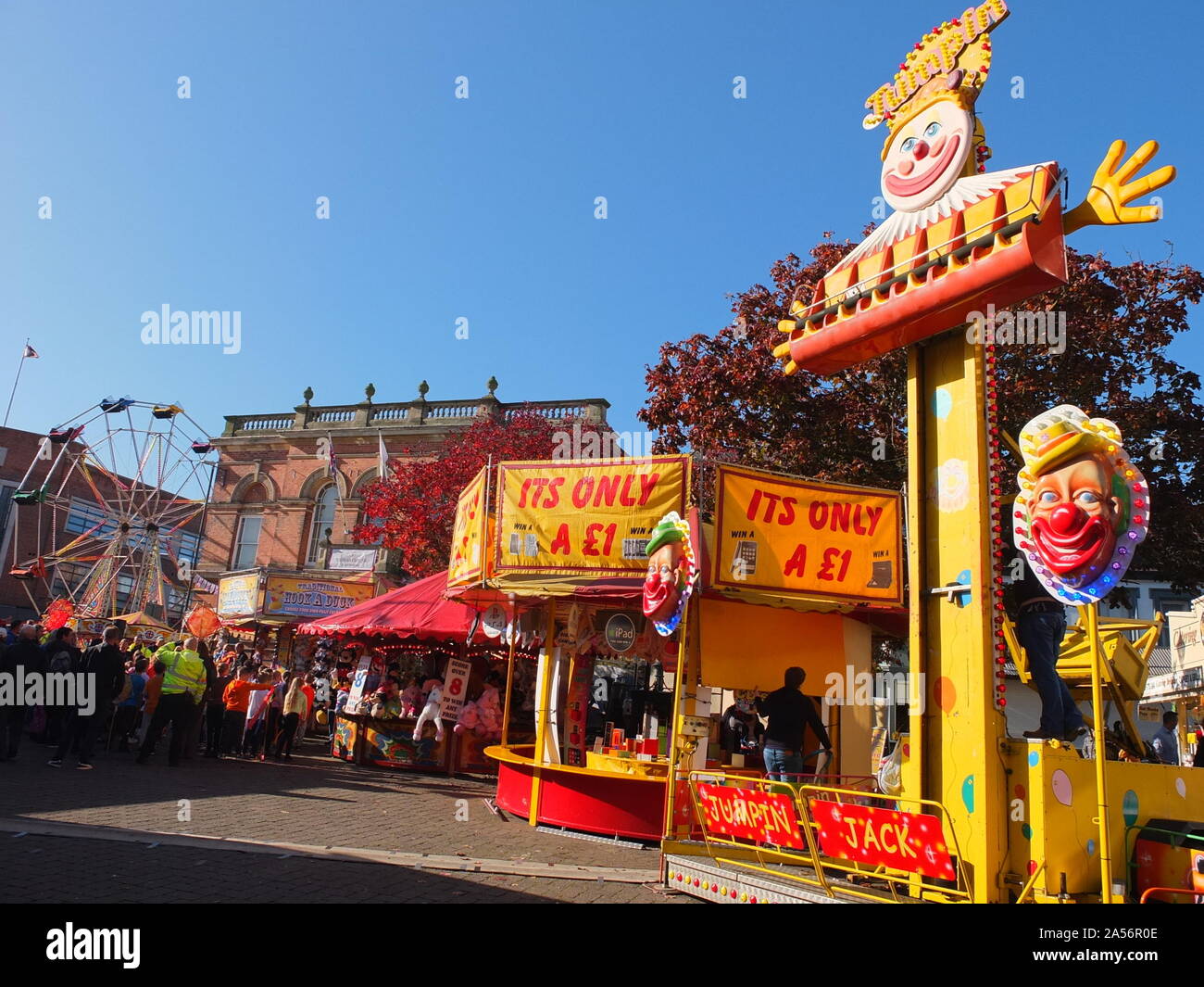 Fun fair rides and stalls outside Town Hall Ilkeston Charter Fair. One of the oldest and largest street fairs in Europe receiving its charter in 1252. Stock Photo