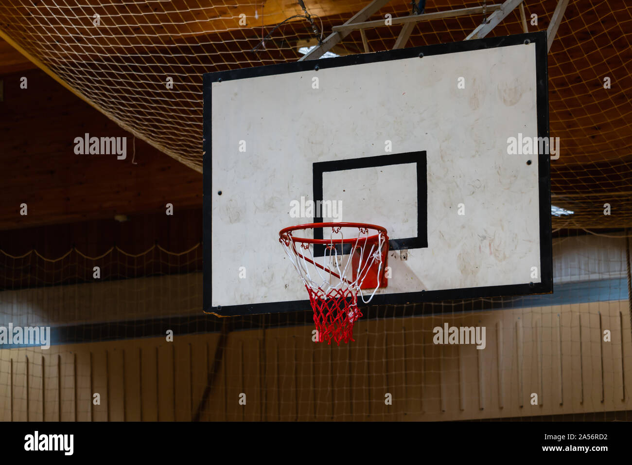 Used basketball backboard hoop net inside of basketball court
