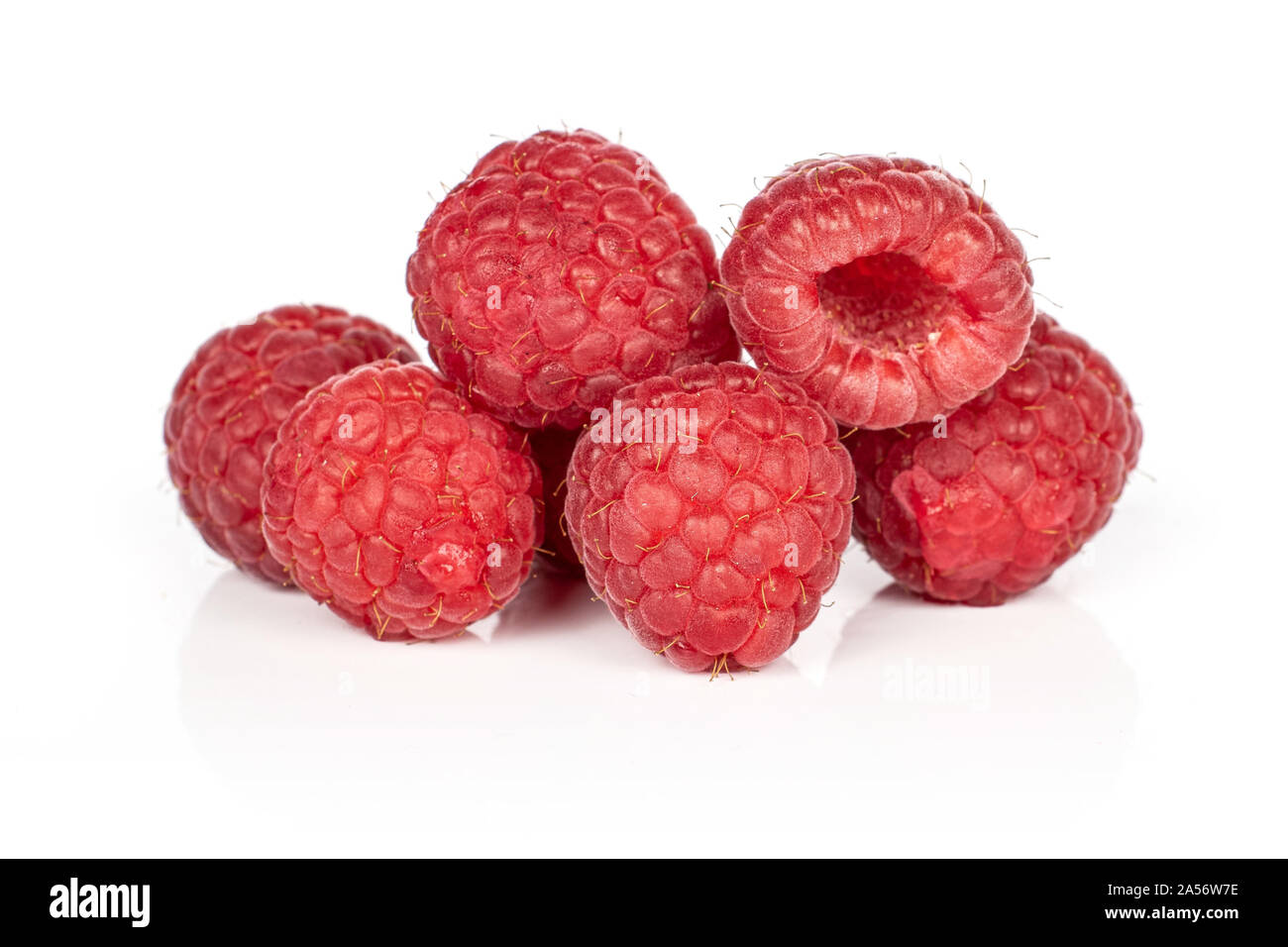 Group of six whole fresh red raspberry isolated on white background ...