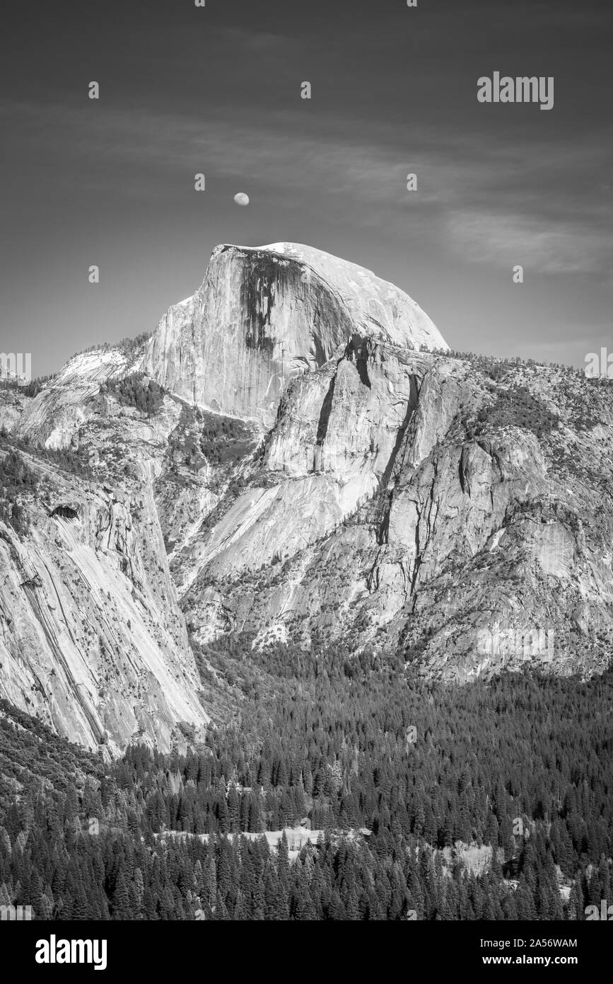 Moon Over Half Dome B&W. Stock Photo