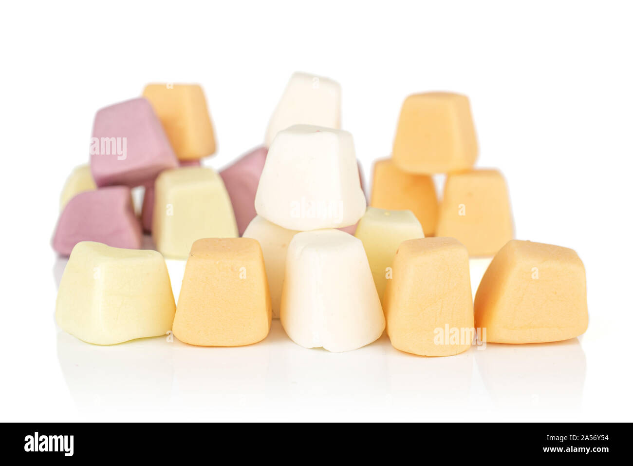 Lot of whole soft pastel candy heap isolated on white background Stock Photo