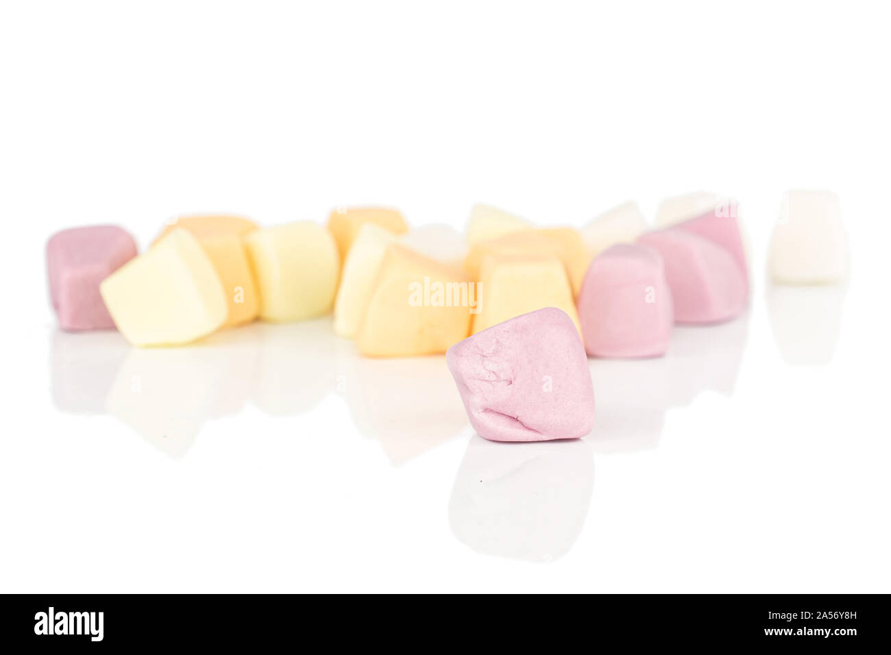 Lot of whole bright soft pastel candy isolated on white background Stock Photo