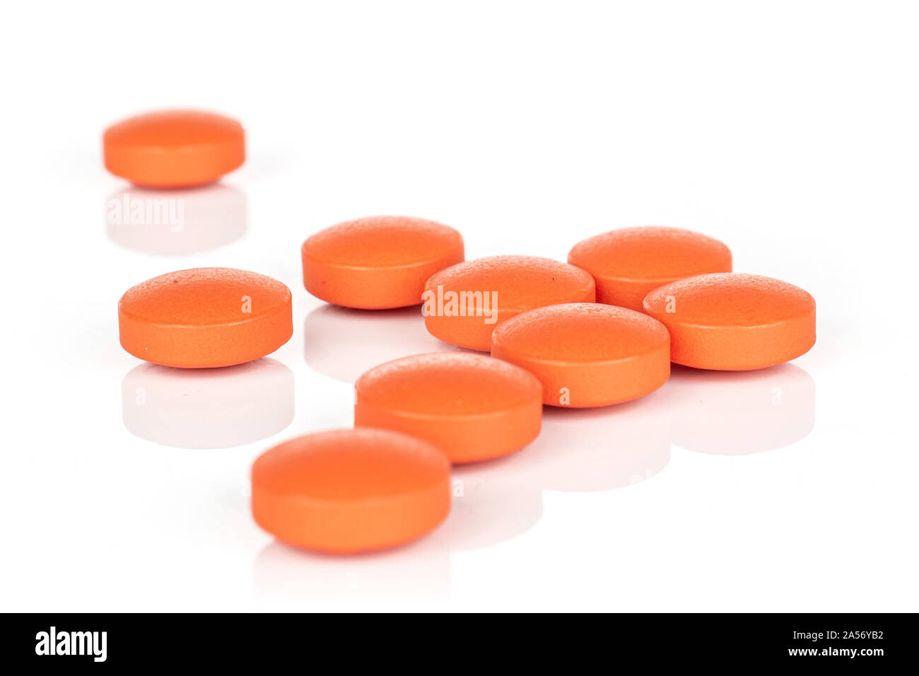 Group of nine whole orange tablet pharmacy isolated on white background  Stock Photo - Alamy