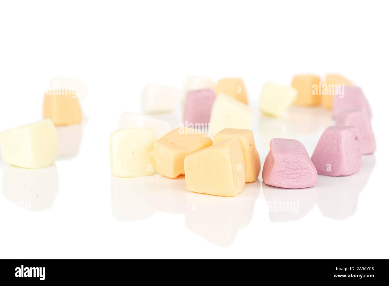 Lot of whole disordered soft pastel candy isolated on white background Stock Photo