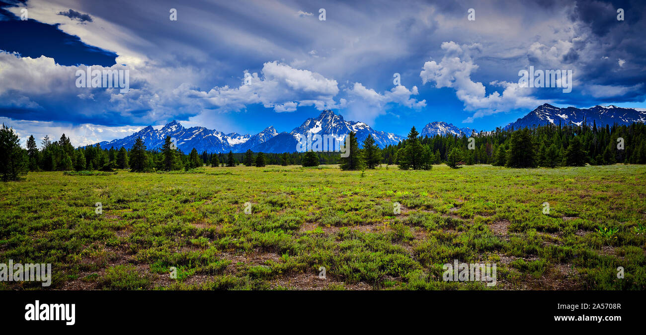Storm clouds over the Grand Teton mountain range. Stock Photo