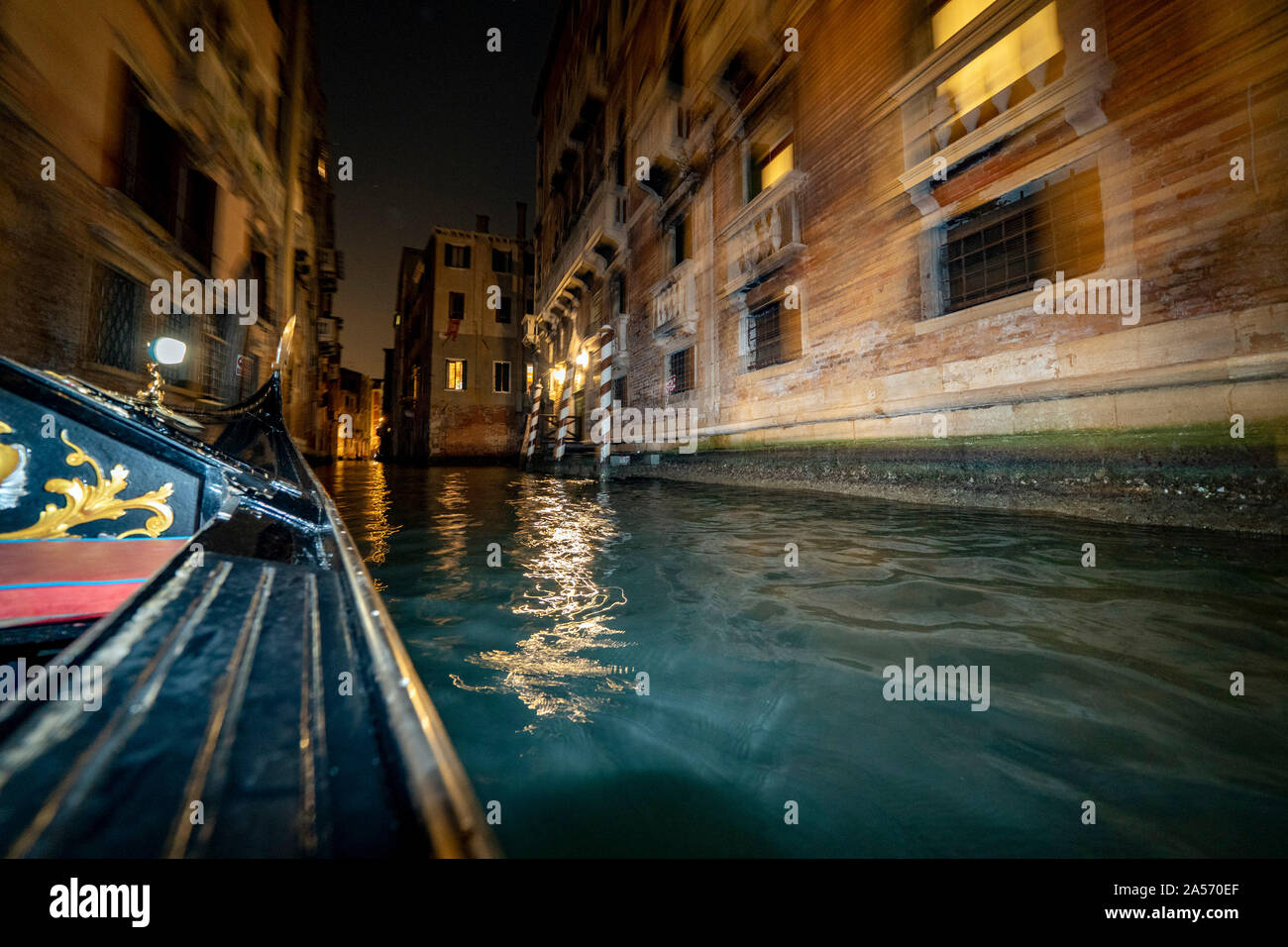 Venice Gondola channels tour at night Stock Photo - Alamy