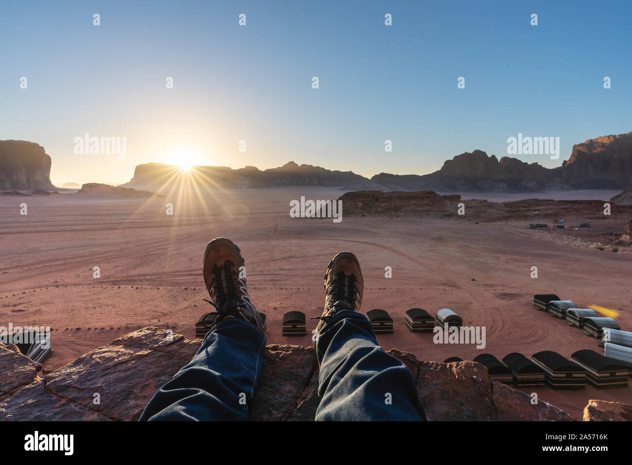 Travelling at Wadi Rum desert in Jordan with sunset landscape Stock Photo