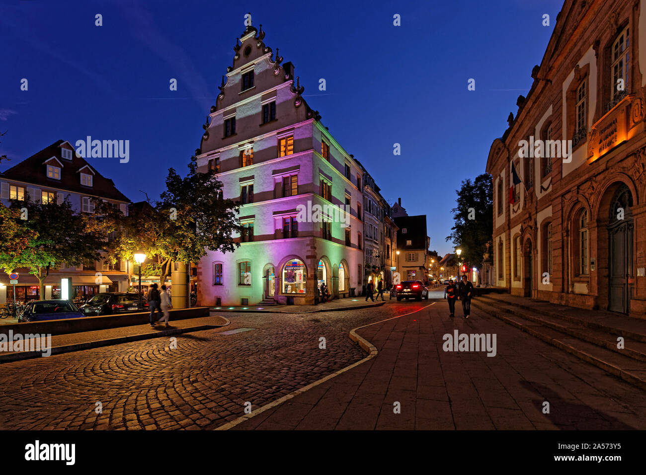 COLMAR, FRANCE, October 11, 2019 : Old typical streets of Colmar at night. The city is renowned for its well-preserved old town and its numerous archi Stock Photo