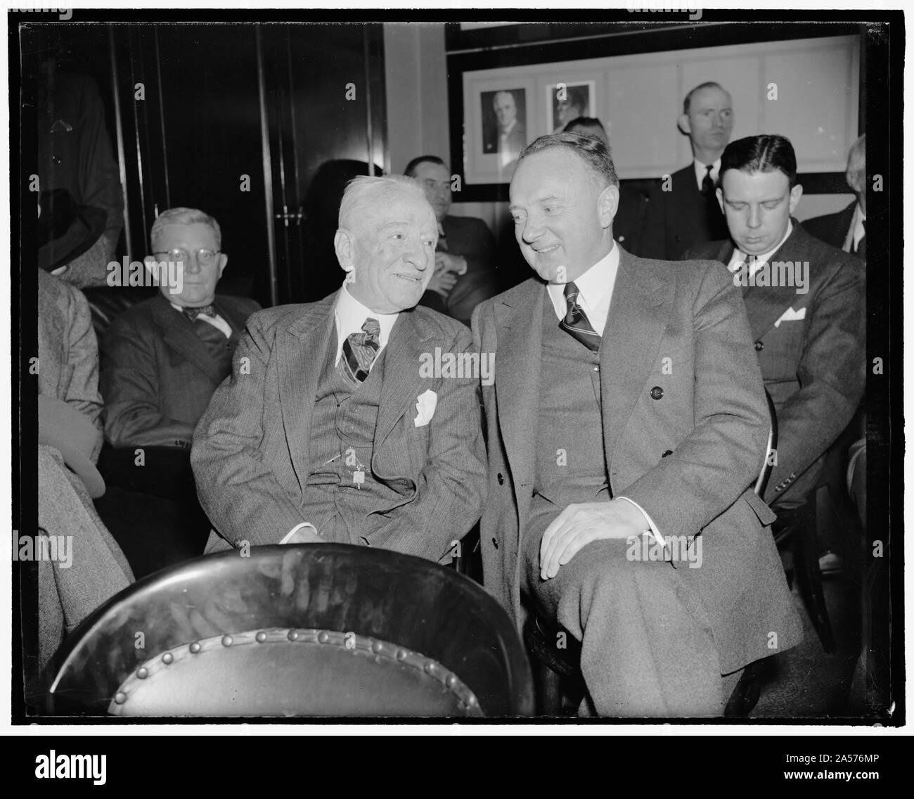 Virginia Senators oppose nomination of Floyd Roberts to federal judgeship. Washington, D.C., Feb. 1. Senators Carter Glass and Harry F. Byrd, who are leading the opposition to the nomination of Floyd Roberts to a Federal District Judgeship in Virginia, are pictured as they listened to testimony before the Senate Judiciary Committee when public hearings on the nomination began, 2-1-39 Stock Photo
