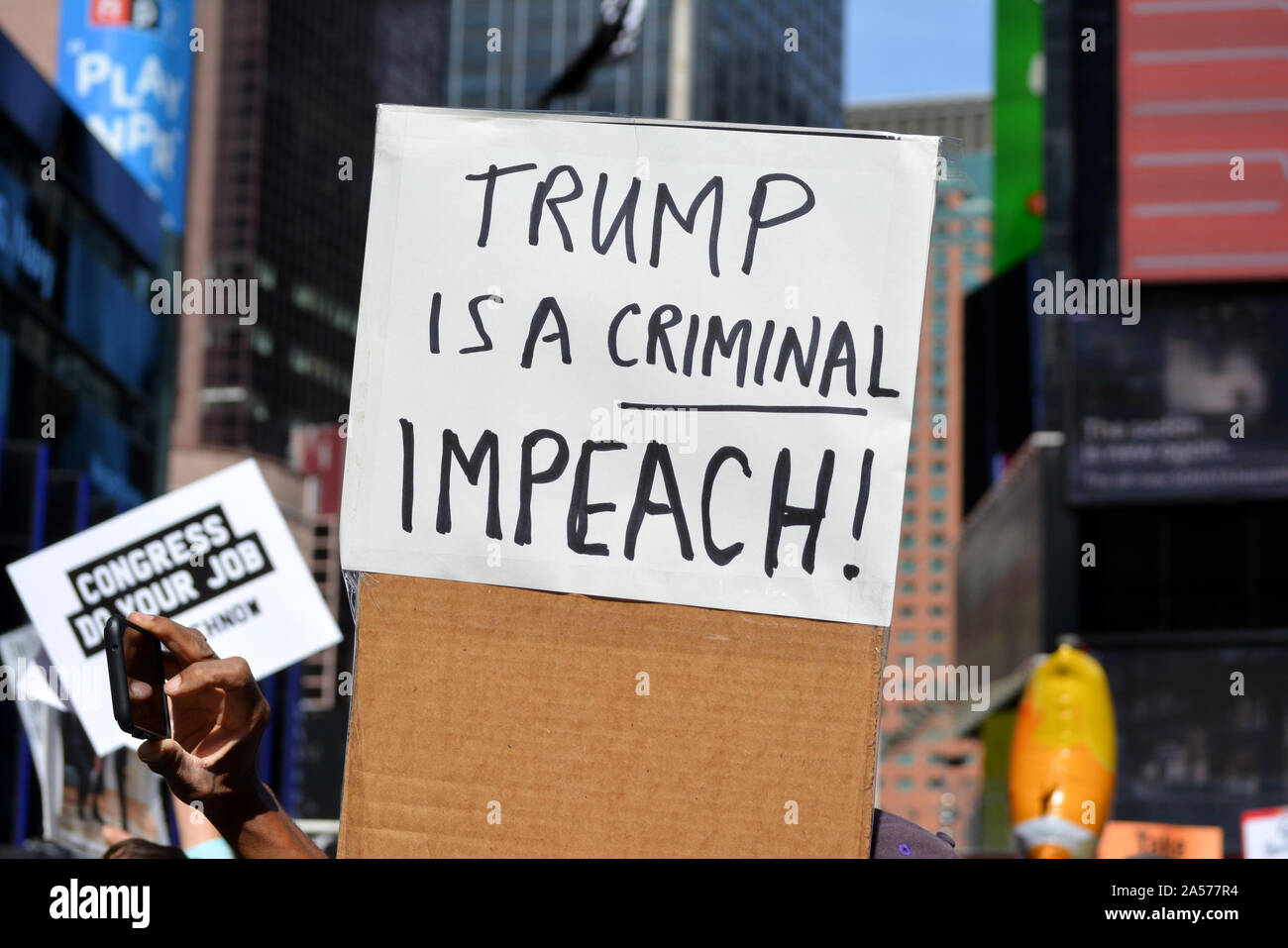 Rally for the impeachment of President Trump in Times Square, New York City. Stock Photo