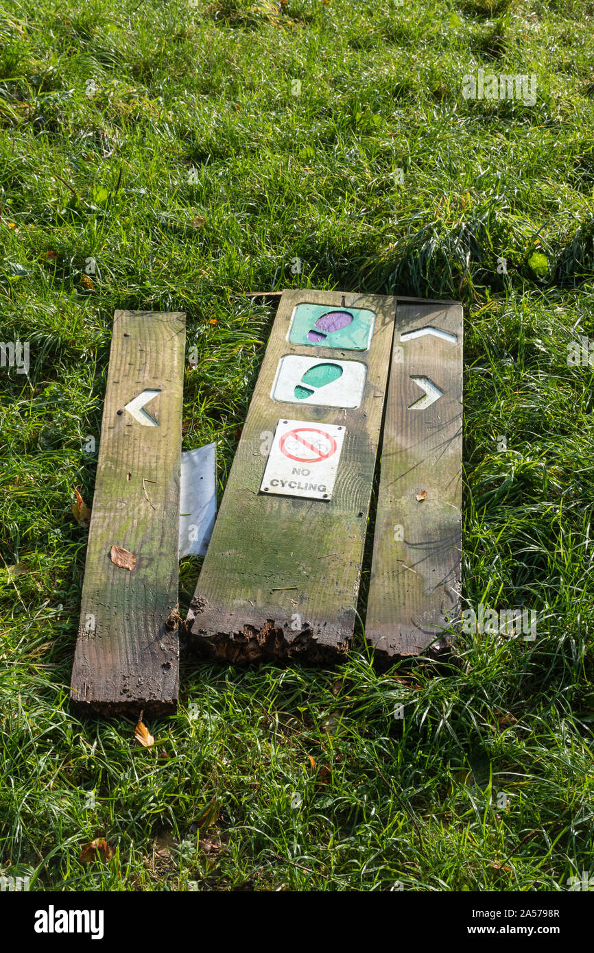 Queen Elizabeth Country Park in the South Downs National Park, Hampshire, UK. Trail sign posts on the ground. Stock Photo