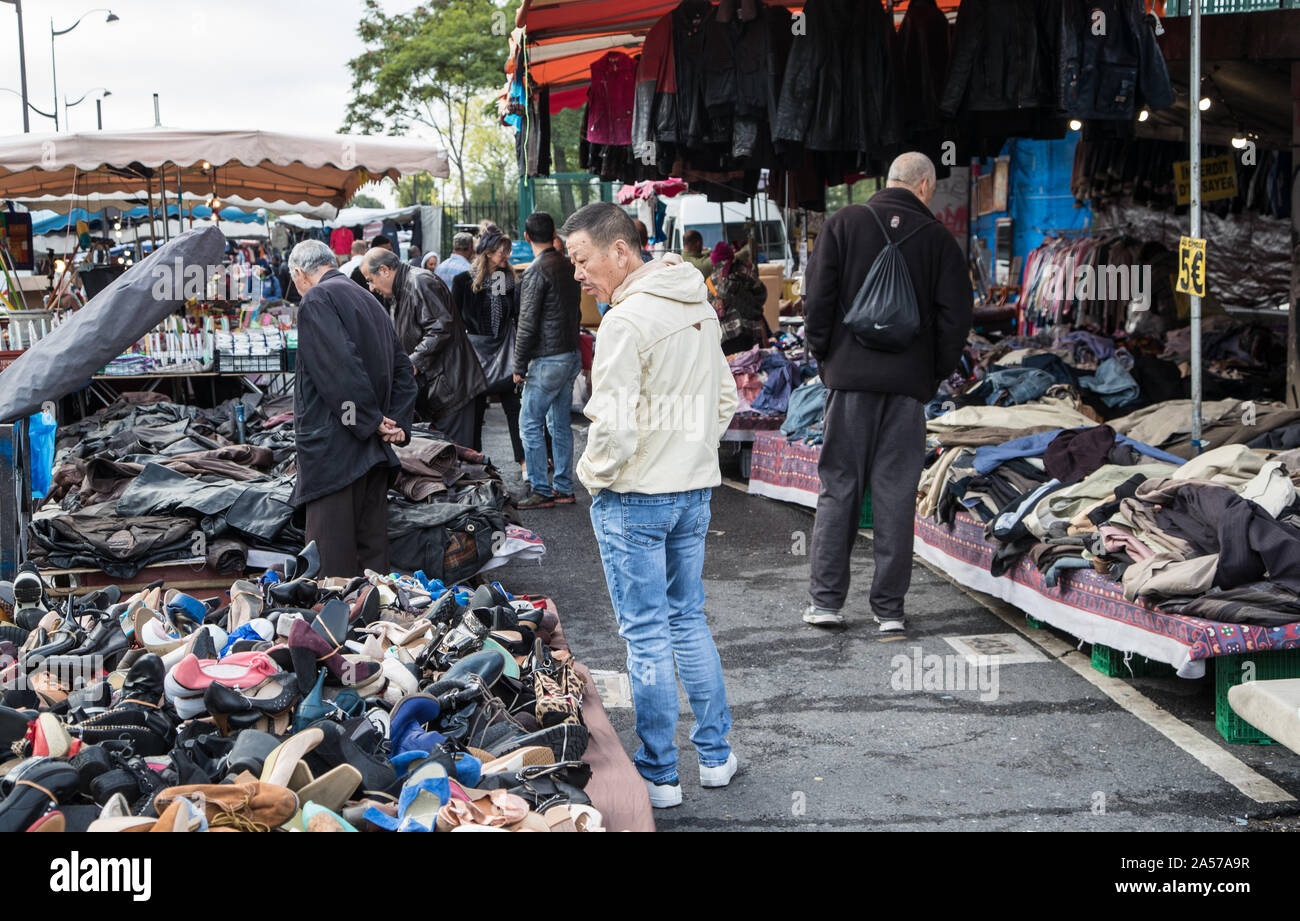 Paris, France - 30th September, 2019: People shopping for bargins at the  Montreuil flea market. one of the oldest flea markets in the capital. It is Stock Photo