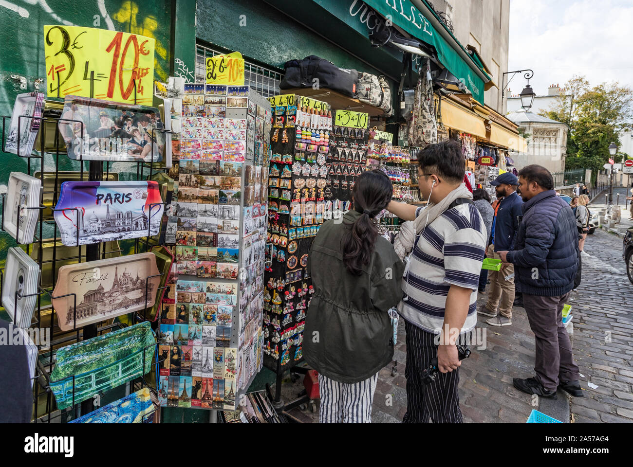 Paris, France - 30th September, 2019: tourists shopping for souvenir keyrings in the touristic area of montmartre in Paris Stock Photo