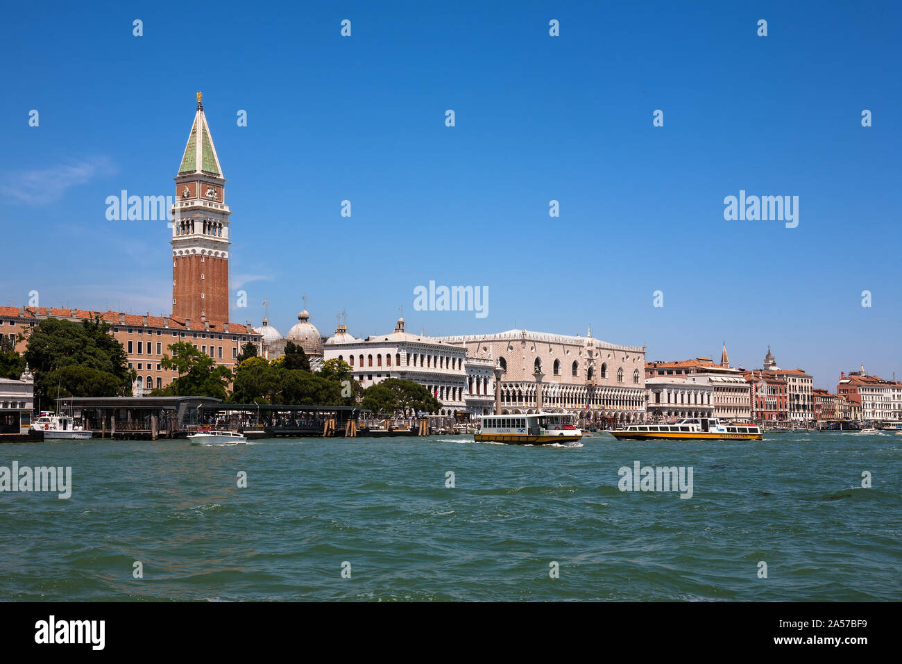 San Marco: the Campanile, Palazzo Ducale, Piazzetta and Biblioteca Marciana and vaporetti - from the Punta della Dogana, Dorsoduro, Venice, Italy Stock Photo