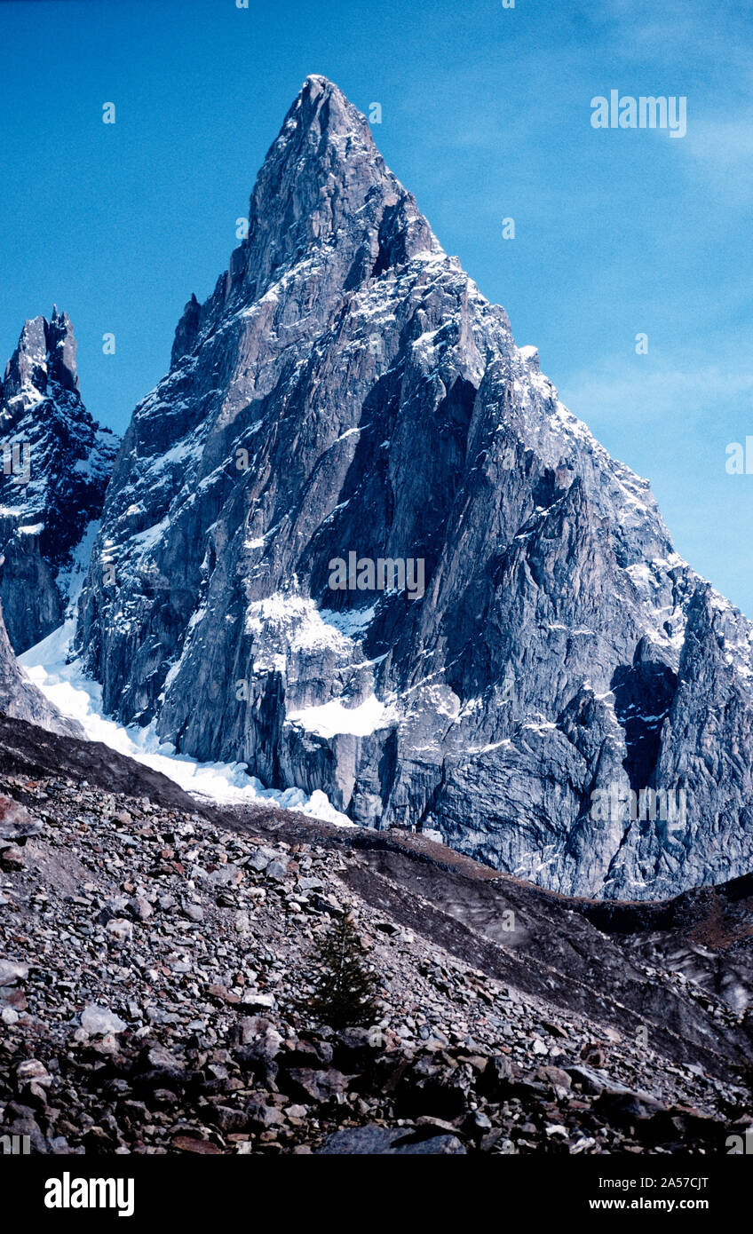 The long and difficult Aiguille Noire de Peuterey above Val Veny in the Italian Alps Stock Photo