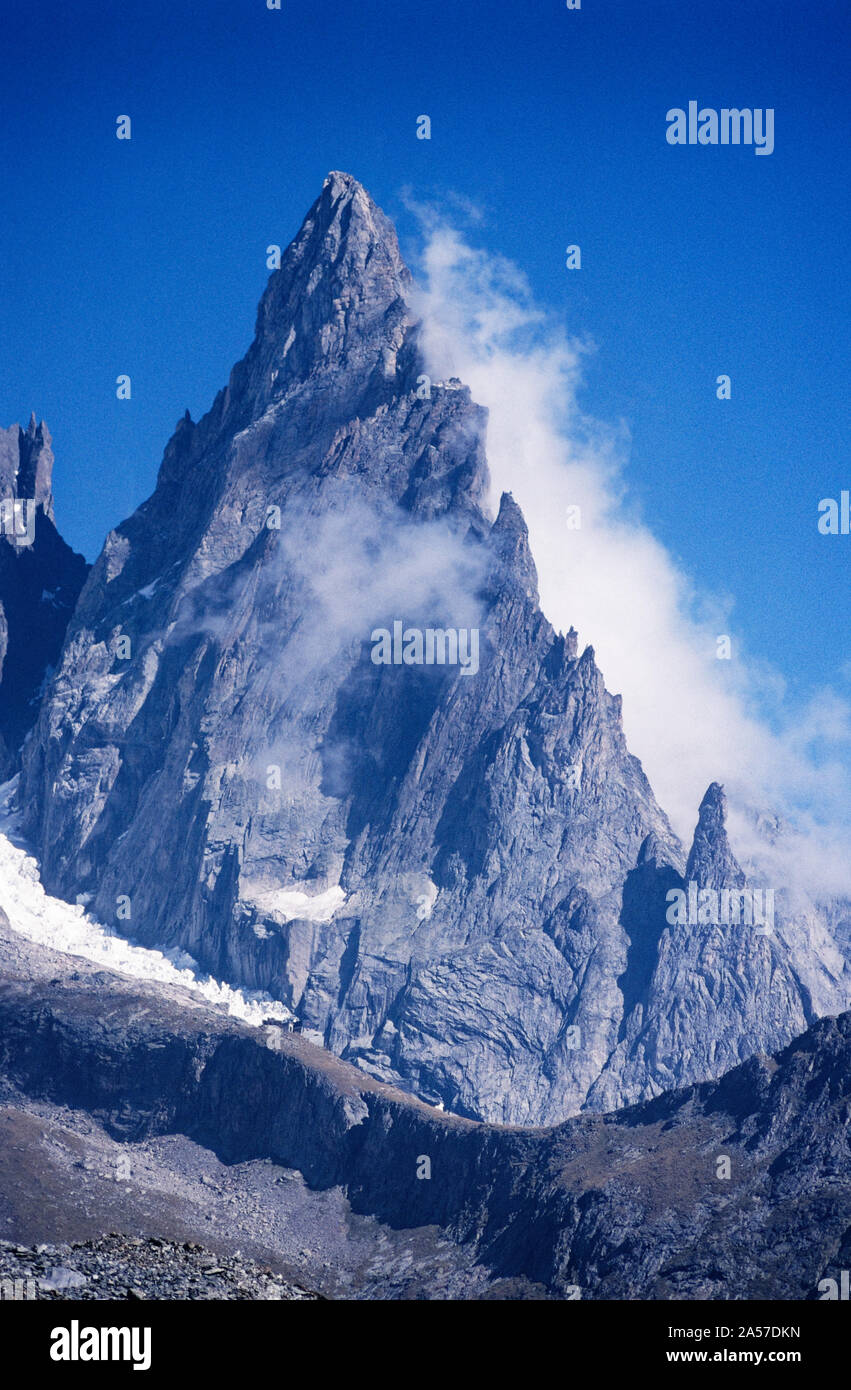 The formidable spire of the Aiguille Noire de Peuterey in the Italian Alps Stock Photo