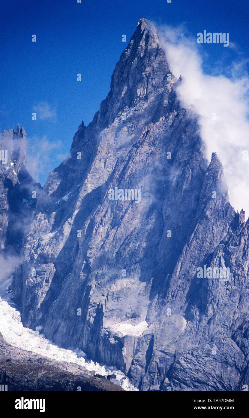 The formidable spire of the Aiguille Noire de Peuterey in the Italian Alps Stock Photo