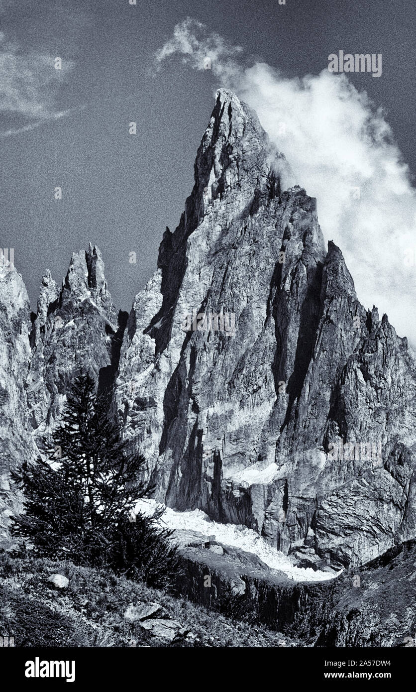 The formidable spire of the Aiguille Noire de Peuterey in the Italian Alps Stock Photo