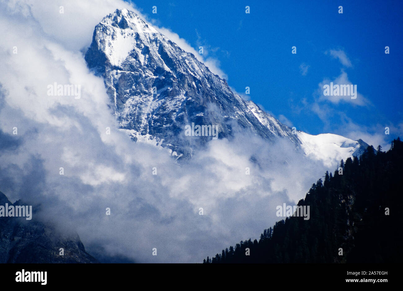 Clouds forming around the Dent Blanche in the Swiss Alps Stock Photo
