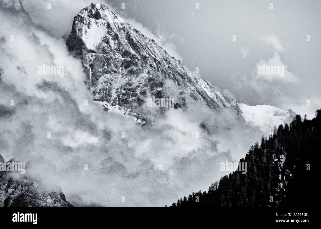 Clouds forming around the Dent Blanche in the Swiss Alps Stock Photo