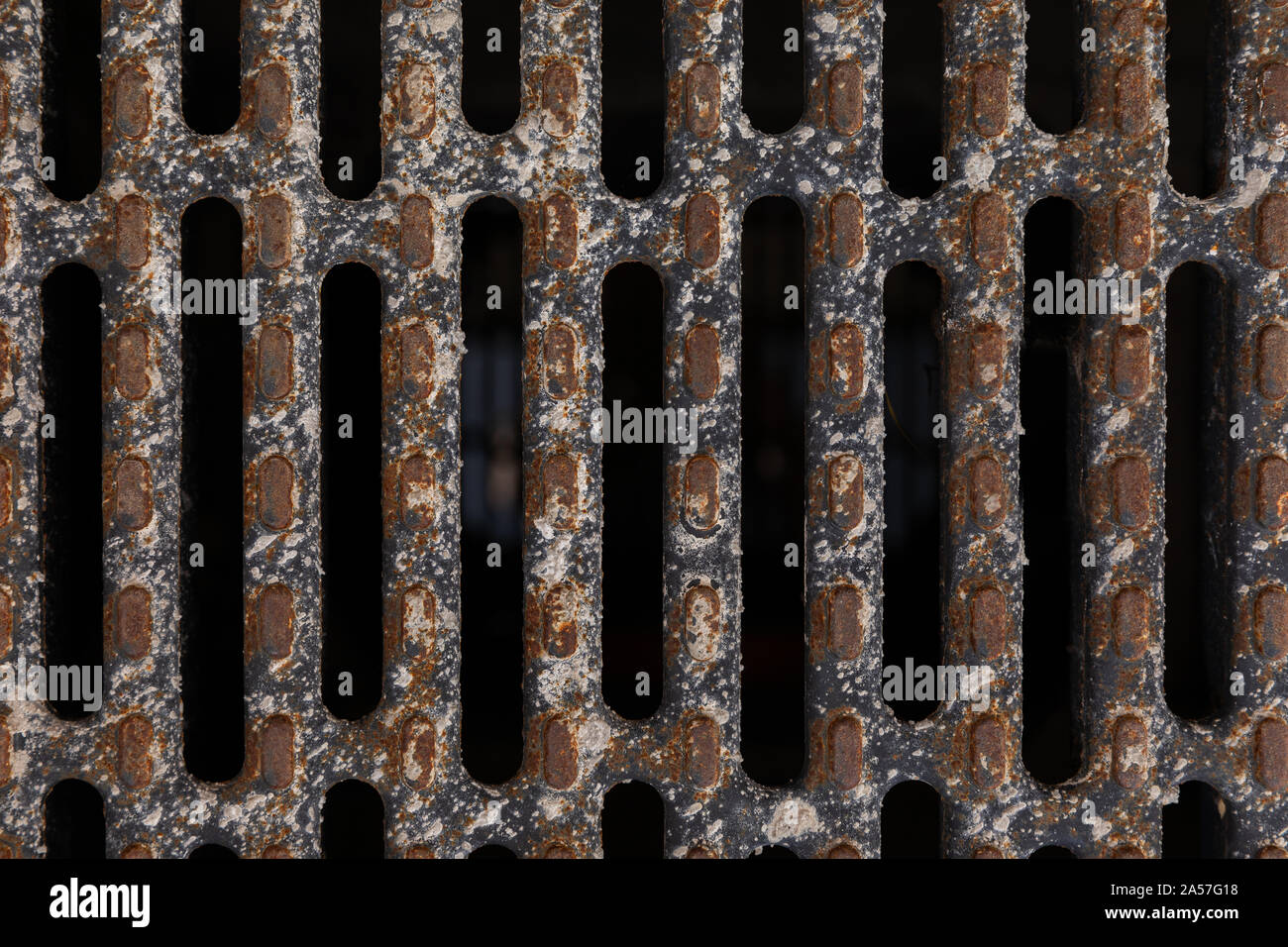 Rusty cast iron grill for water drainage or ventilation grille, for