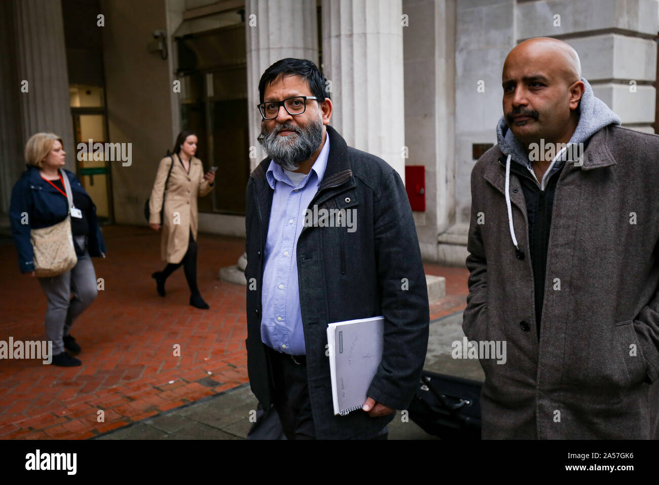 Protest group member Amir Ahmed leaving Birmingham's Civil Justice Centre after a judge reserved his decision on an application to keep a protest exclusion zone around Bimringham's Anderton Park Primary School. Stock Photo