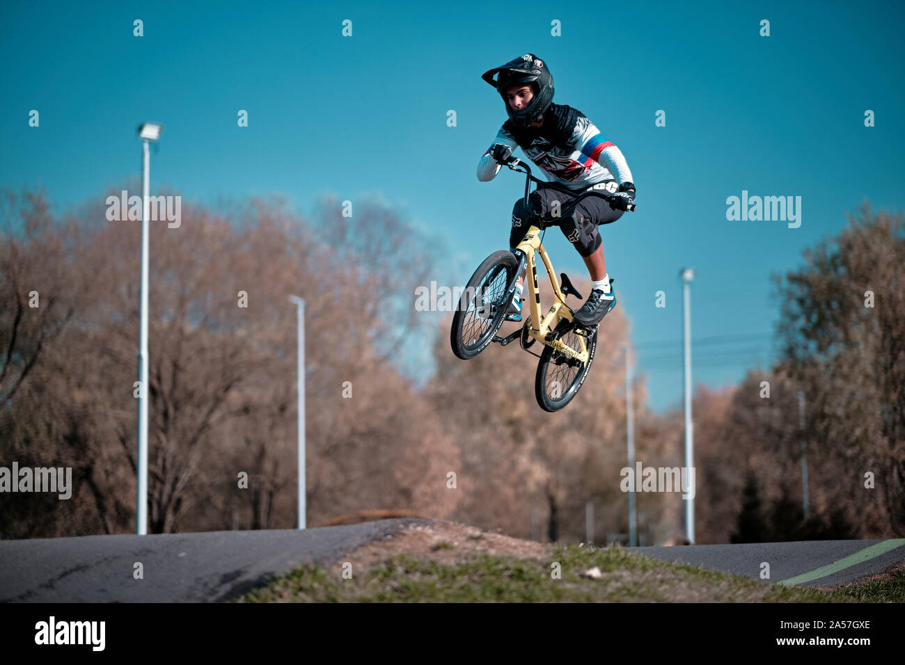 Moscow, Russia - Oct 18, 2019: Young boy jumping with his BMX Bike at pump  track. BMX race. Cyclist riding on pump track. Rider in action at bike spor  Stock Photo - Alamy