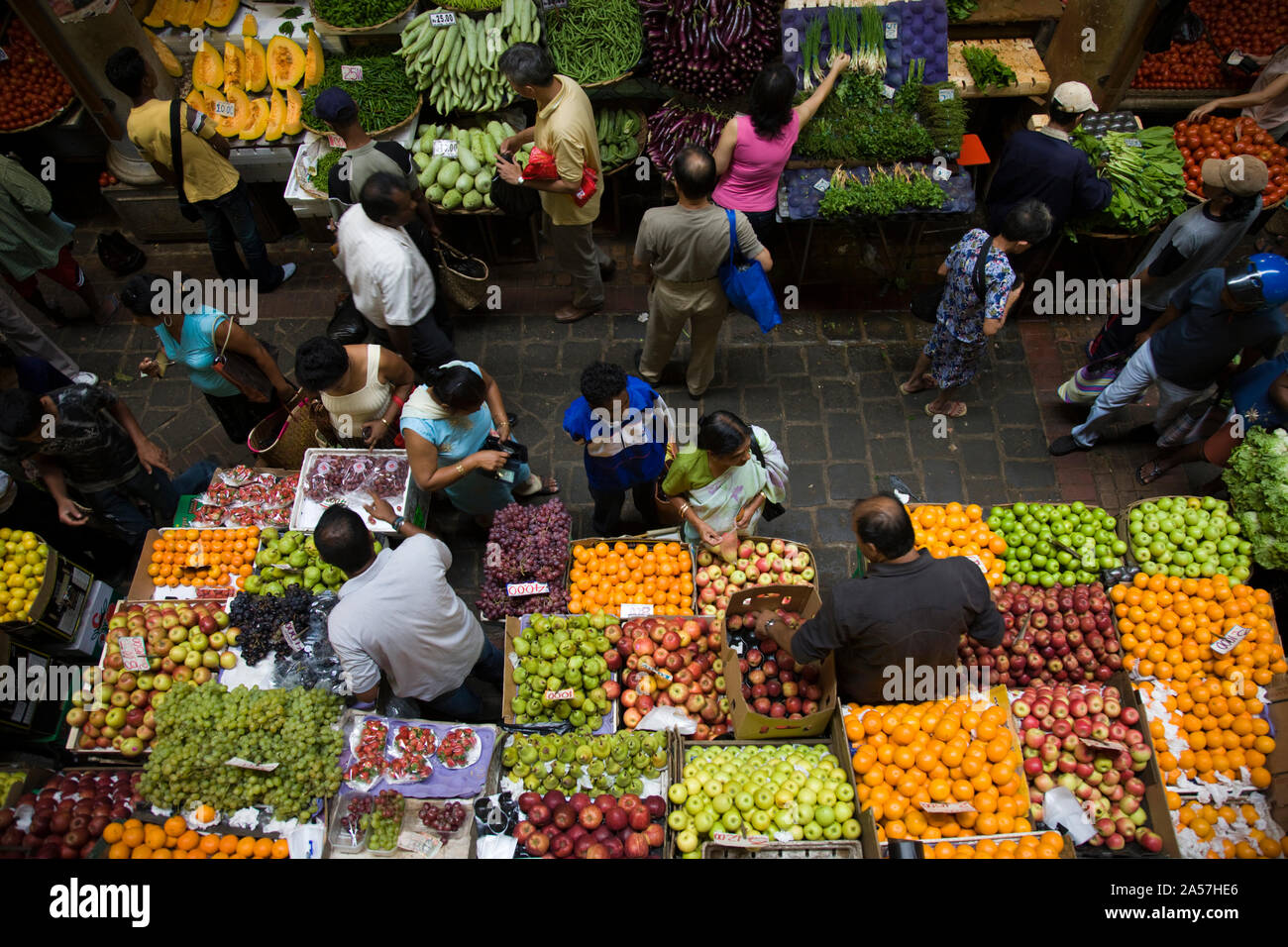 People shopping in a vegetable market, Central Market, Port Louis, Mauritius Stock Photo