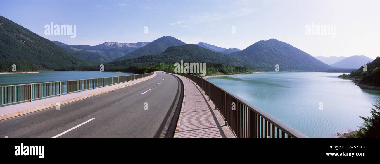 Bridge across a lake, Sylvenstein Lake, Bavaria, Germany Stock Photo