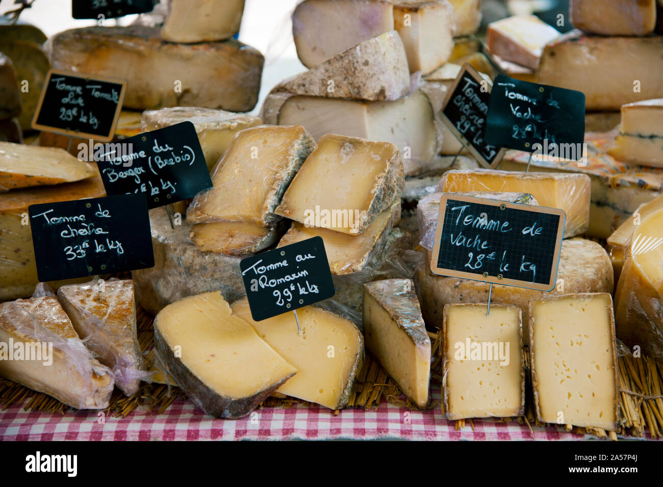 Cheese for sale at a market stall, Lourmarin, Vaucluse, Provence-Alpes-Cote d'Azur, France Stock Photo