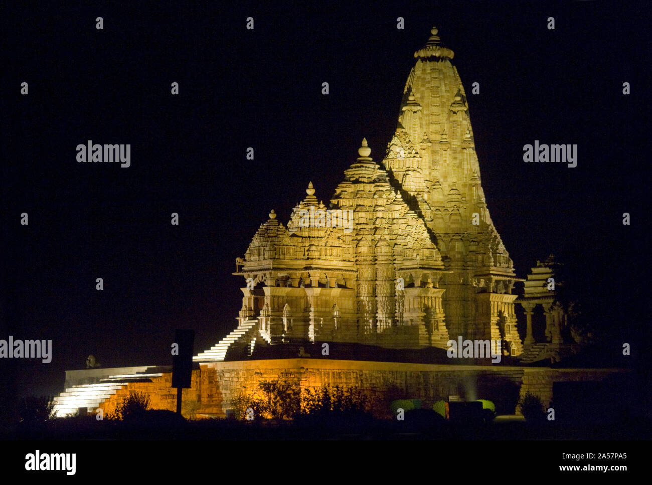 Temple in a town, Khajuraho, Chhatarpur District, Madhya Pradesh, India Stock Photo